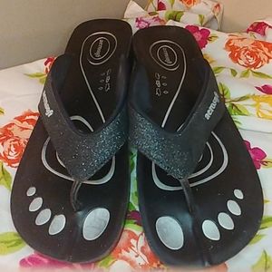 Flip flops with a slight wedge heel